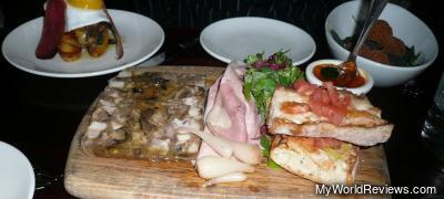 First Course - Duck egg wIth mojama, Pumkin and goat cheese croquetas, Charcuterie de la casa with black truffles