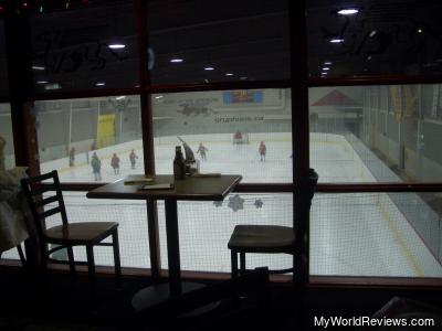 Be entertained by a hockey game while you eat