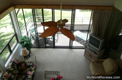 The main room (with a pull-out couch), and the outdoor lanai patio area