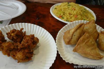 Vegetable Pakora/paleetir, Rice, and Samosas
