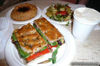 Sandwich of the day, potato salad, walnut raspberry scone, and cappuccino