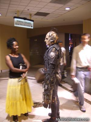 Borg conversing with visitors outside the star trek area